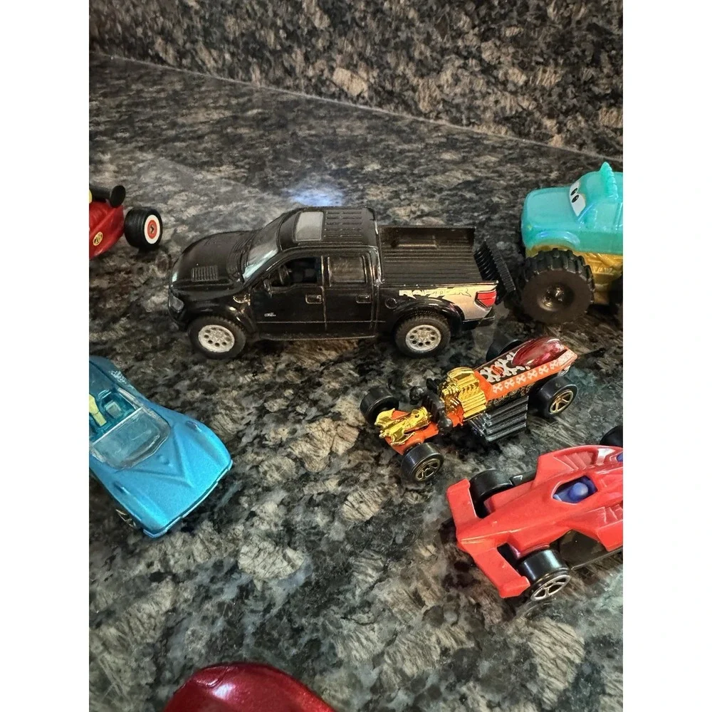 Hot Wheels Collection. McDonald's Happy Meal, Elsa Frozen. Pixar's Cars  Ford
